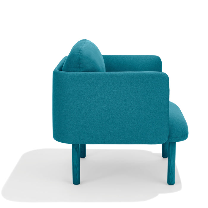 Blue fabric armchair with wooden legs on a white background. (Teal)