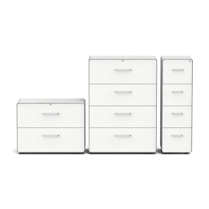 Three white modern filing cabinets in different sizes against a white background. (White)
