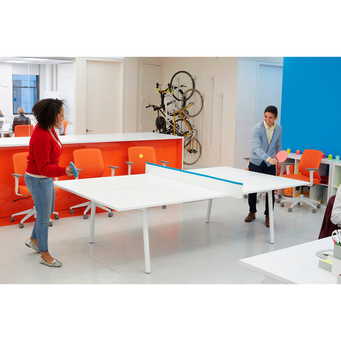 Two colleagues playing table tennis in a modern office break room. (Dark Gray)