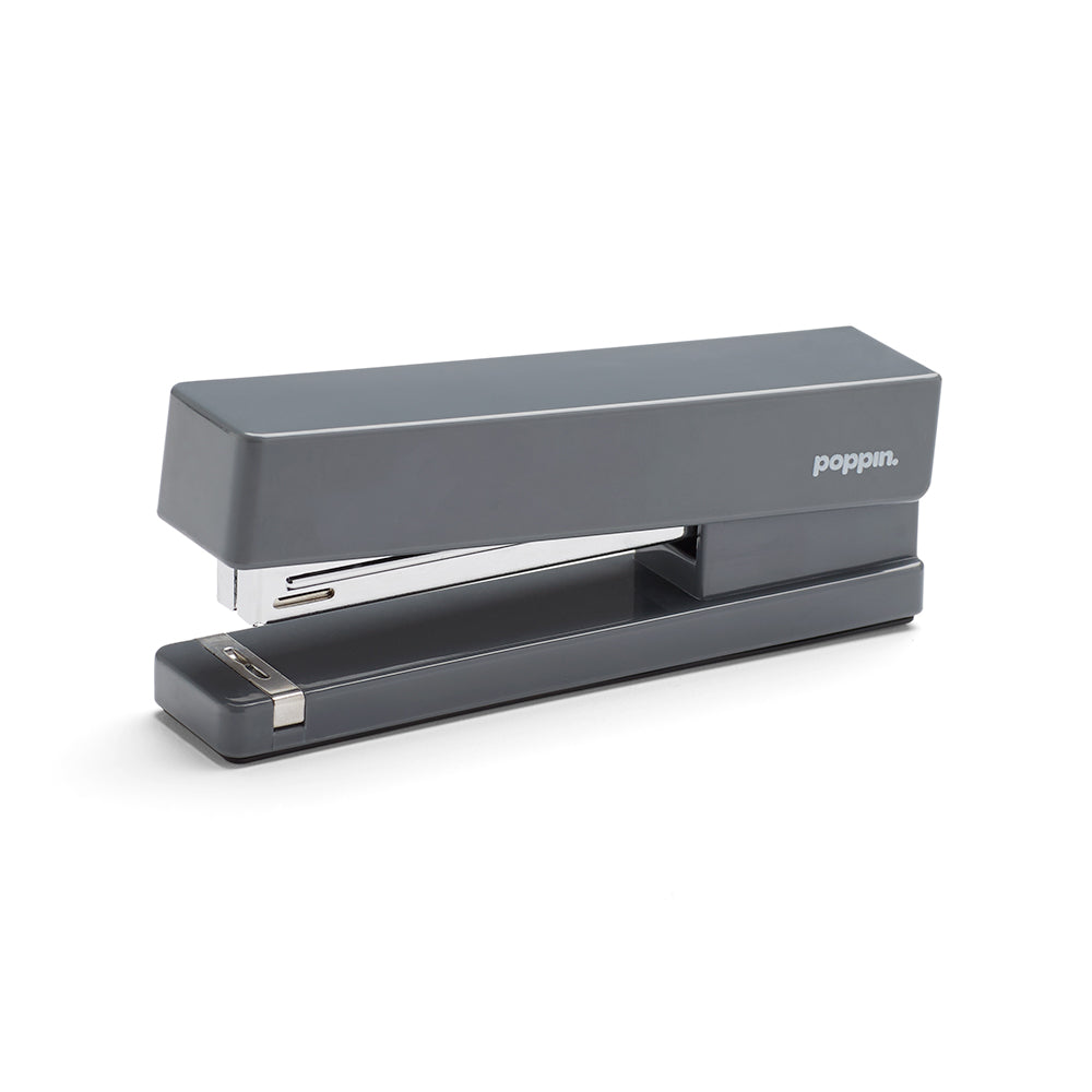 Gray Poppin desktop stapler isolated on a white background. (Dark Gray)