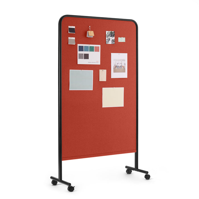 Red mobile bulletin board on wheels with assorted notes and pictures pinned to it. (Black-Brick)