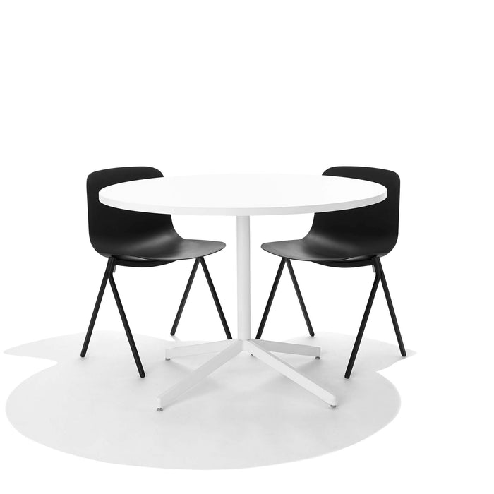 Round white table with two black chairs on a white background. (Black)