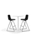 Two modern black bar stools with white table on a white background. (Black)