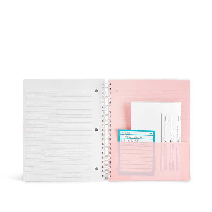 Open notebook with lined pages beside a pink folder with documents on white background. (Blush-3 Subject)