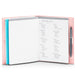 Pink notebook with a handwritten grocery list on an open page. (Blush)