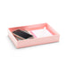 Pink desk organizer with smartphone and white notepad on white background. (Blush)