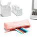 Pink pencil case with colorful pens on a desk next to a laptop and stationery (Blush)