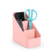 Pink desk organizer with smartphone and scissors on white background. (Blush)