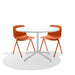 Two orange modern chairs at a white round table on a white background. (Brick)