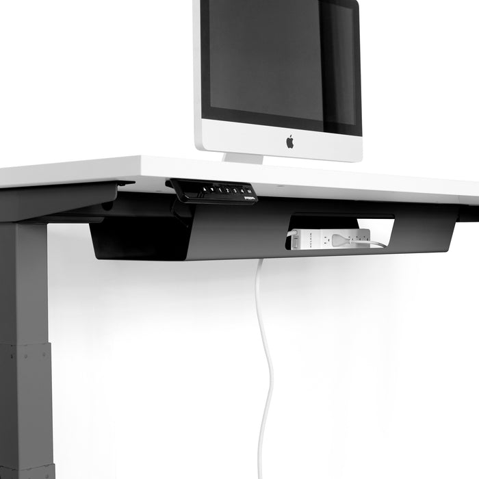 Modern standing desk with adjustable height featuring an iMac and smartphone dock in a black and white office setting. (Charcoal)