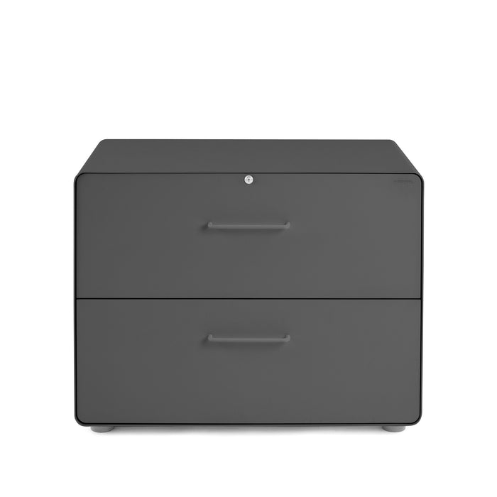 Modern gray two-drawer filing cabinet on a white background. (Charcoal)