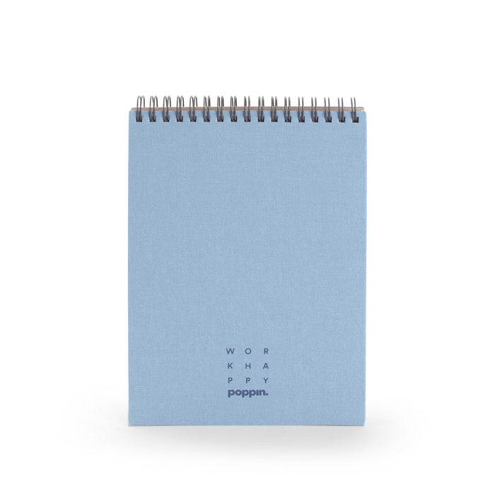Blue spiral notebook with "Work Happy" text on cover against white background. (Coast)
