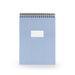 Blue spiral notebook with 'take note' text on cover against white background. (Coast)