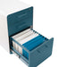 Open teal file cabinet with hanging folders on white background. (Slate Blue-White)