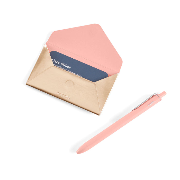 Elegant stationery set with pink pen and personalized envelopes on white background. (Gold)
