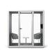 Modern office pod with sliding door, two chairs and a small table on a white background. (Gray)
