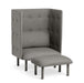 High-back gray armchair with tufted details and matching ottoman on white background. (Gray)