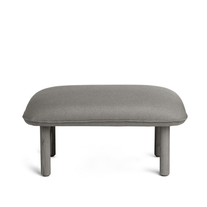 Gray upholstered bench with wooden legs on white background. (Gray)