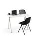 Modern minimalist home office setup with laptop on white desk and black chair. (Black)