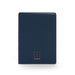 Navy blue Poppin notebook with 'Work Happy' slogan on cover against white background. (Lagoon)