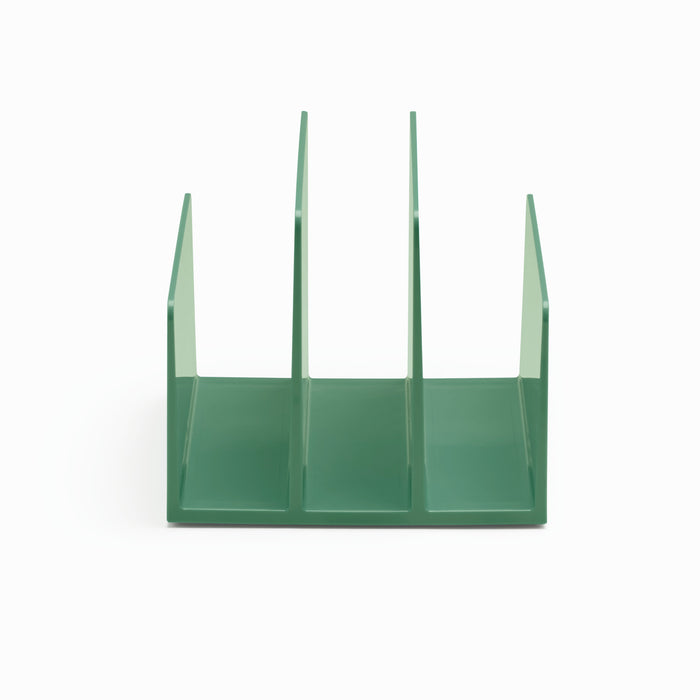 Green acrylic desk organizer with vertical slots on white background. (Sage)