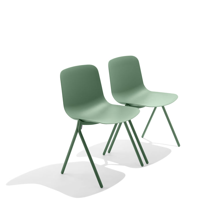 Two green modern design chairs on a white background. (Sage)