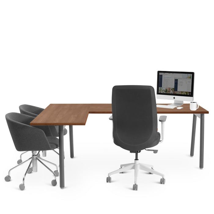 Modern office workspace with wooden desk, ergonomic chairs, and desktop computer on white background. (Walnut)