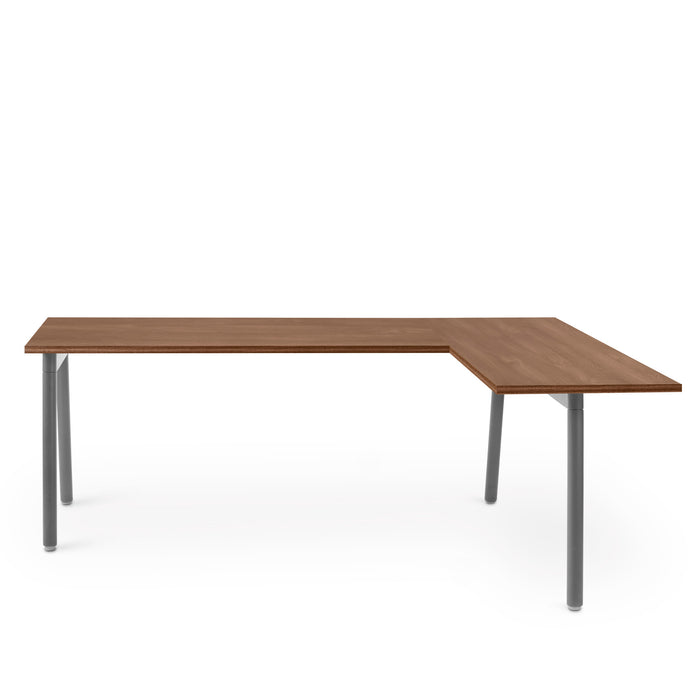 Modern L-shaped wooden desk with metal legs on a white background. (Walnut)