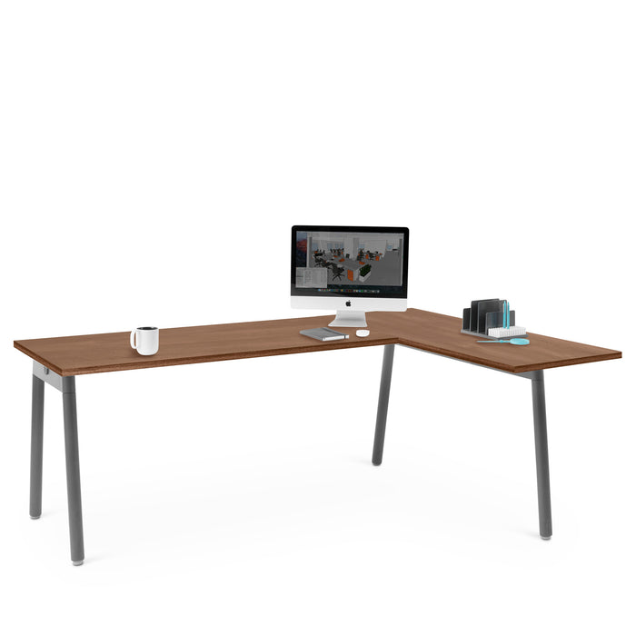Modern office desk with computer, coffee cup, and stationery items on white background. (Walnut)