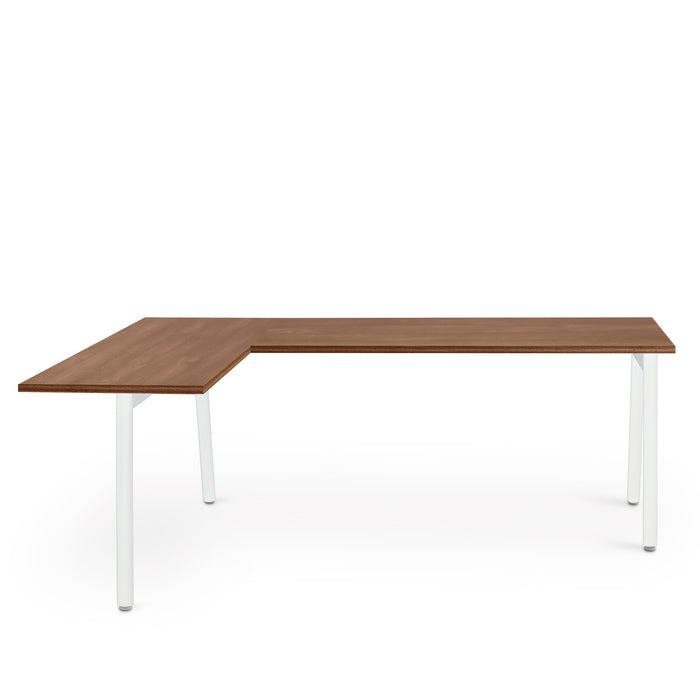 Modern L-shaped wooden desk with white legs on a white background (Walnut)