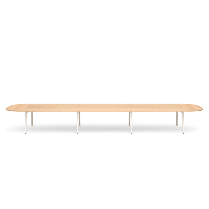 Modern modular office conference table with wooden top and white legs on a white background. (Natural Oak-246&quot;)