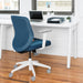 Modern blue office chair and laptop on white desk with window view. (Slate Blue-Mid Back)