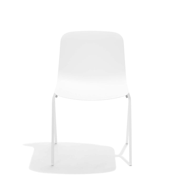 White modern chair on a white background (White)