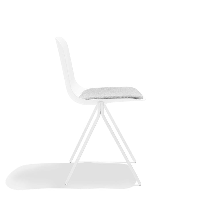 Modern white chair with cushion against a white background. (White)