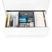 Open drawer filled with organized office supplies, folders, and documents. (White)