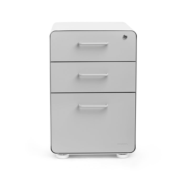 Modern white three-drawer file cabinet isolated on a white background. (Light Gray-White)