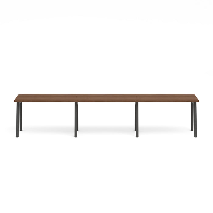 Modern long brown wooden table with black legs isolated on white background. (Walnut-47&quot;)