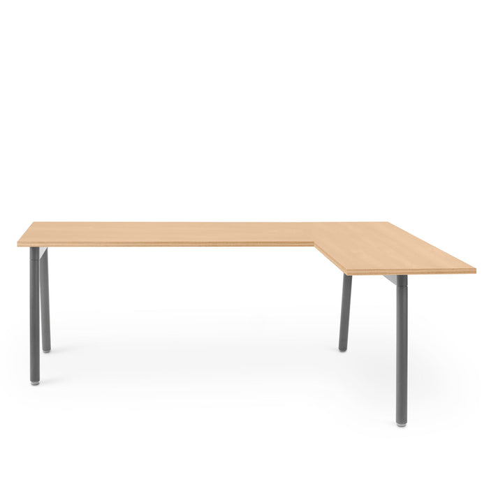 Modern L-shaped office desk with wooden top and metal legs on white background. (Natural Oak)