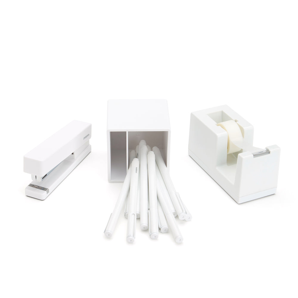 White office supplies including pens, tape dispenser, and stapler on a white background. (White)