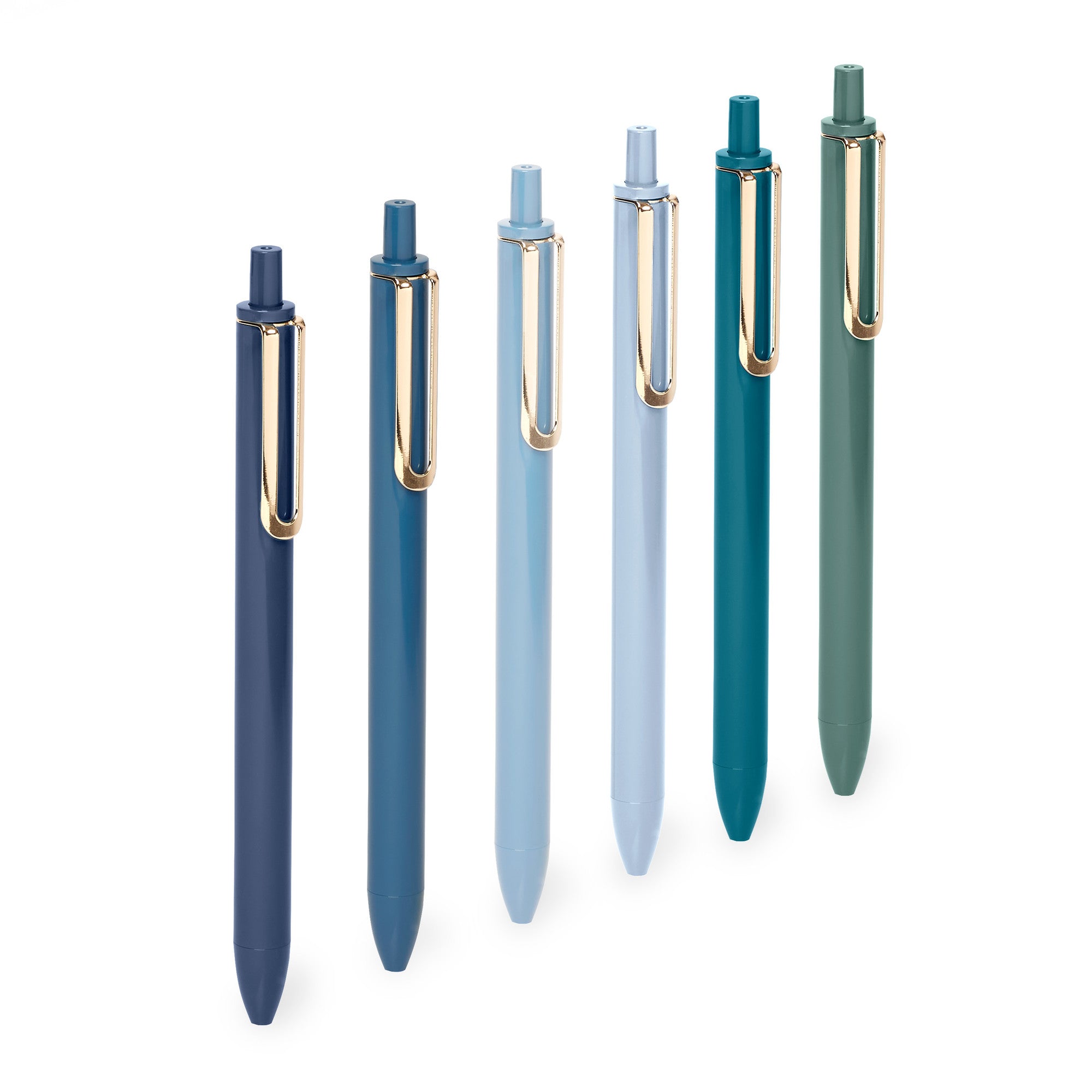 Variety of color ballpoint pens with caps on white background. 