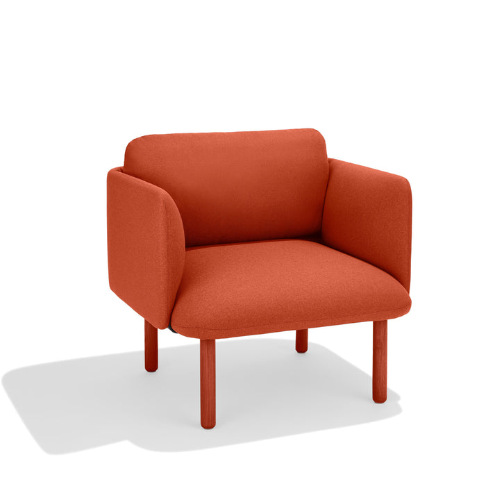 Modern red fabric armchair on a white background. (Brick)