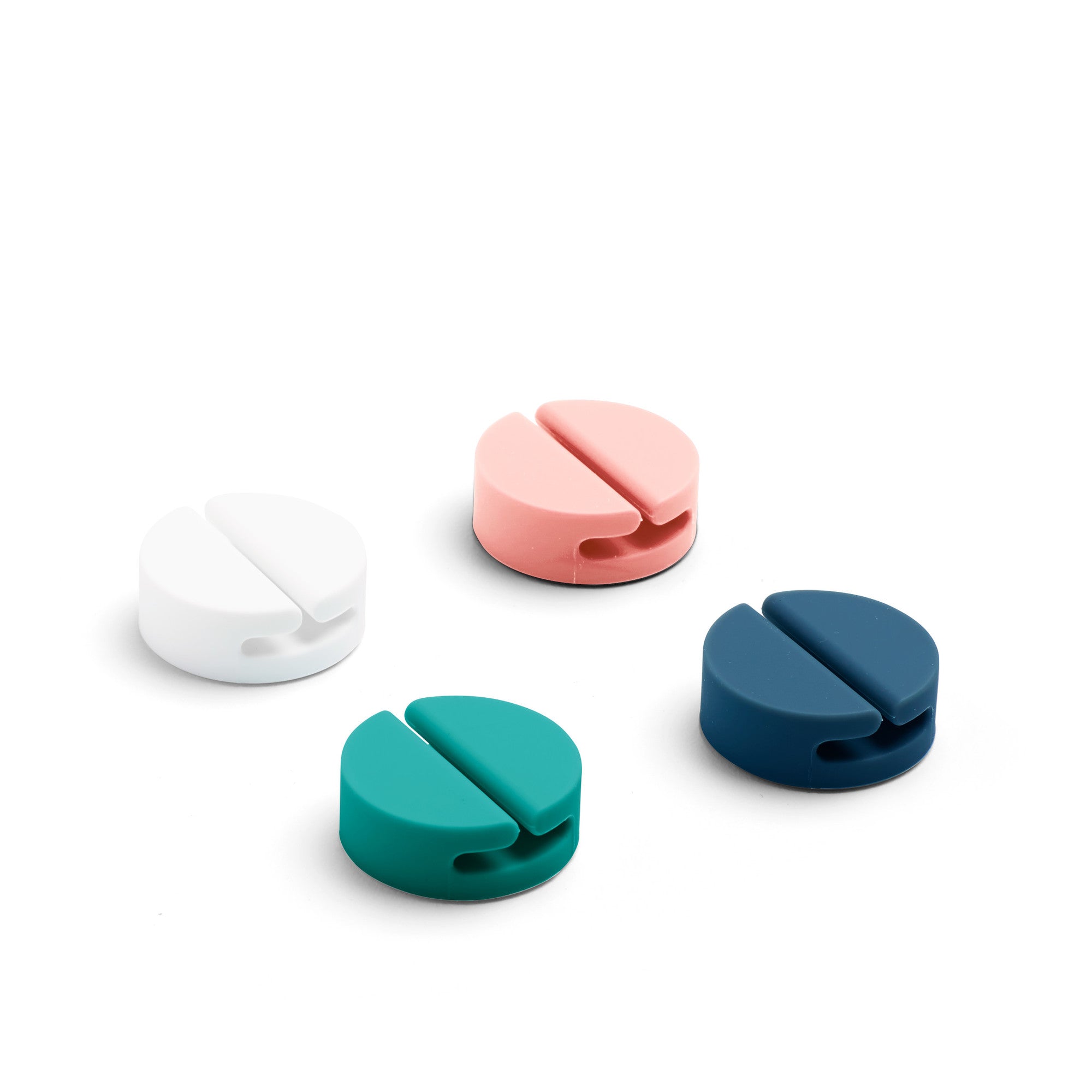 Colorful magnetic cable holders on white background (Contemp. Assorted)