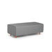 Modern gray fabric ottoman with orange legs on a white background. (Gray)