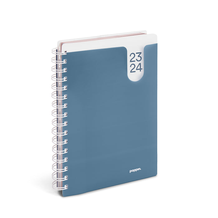 Blue spiral notebook with numbered tabs isolated on white background. (Slate Blue)