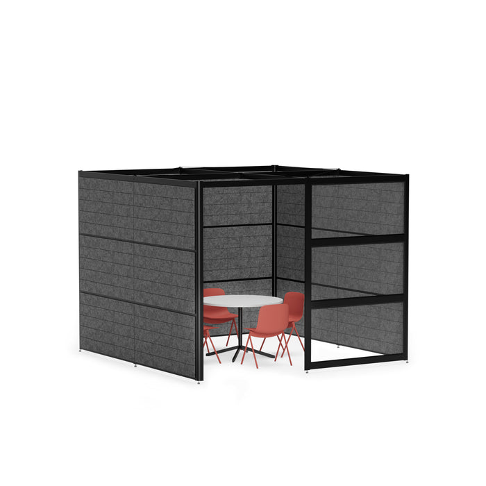 Modern office cubicle with black partitions and a round table with four red chairs. (Black-Private-Black Panel)