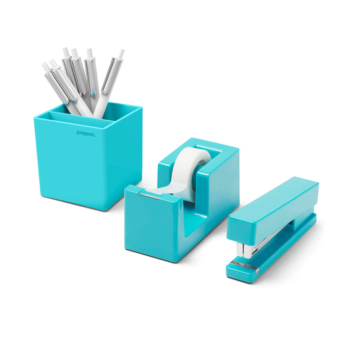 Turquoise desk organizer set with pens, tape dispenser, and stapler on white background. (Aqua)