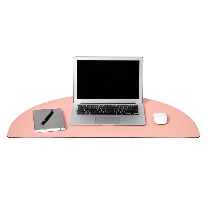Modern workspace with laptop, notepad, pen, and mouse on pink mat. (Blush)