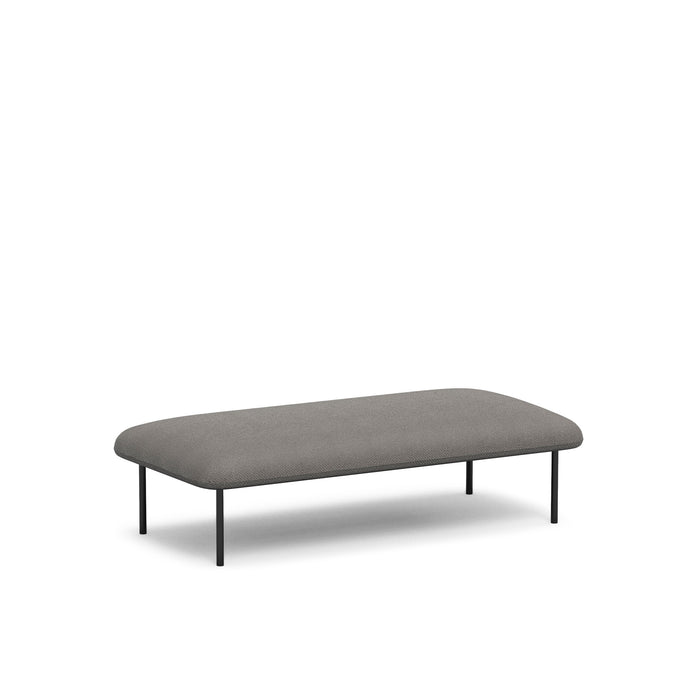 Modern gray fabric oval bench with black metal legs on white background. (Gray)
