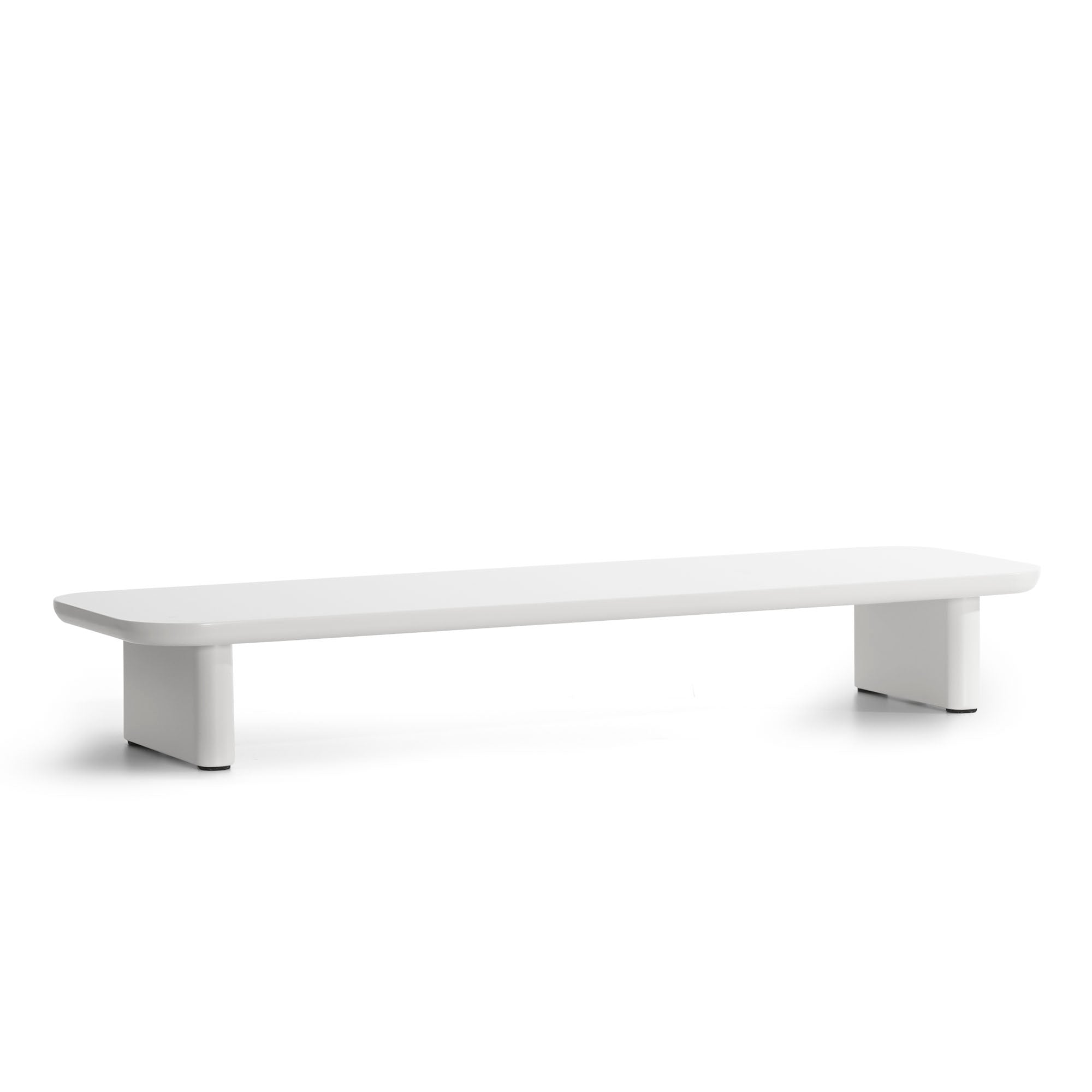 Modern white low bench on a white background. (White)