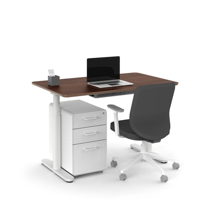 Modern office desk with laptop, ergonomic chair, and filing cabinet on white background. (Walnut-48&quot;)